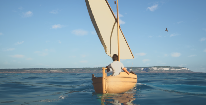 Llaüt navegando a vela con su estela sobre el mar